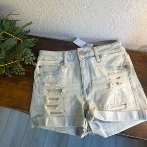 American Eagle Hi-rise shortie next level stretch distressed shorts. Size 4